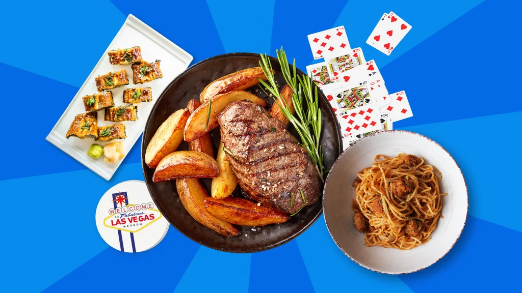 Various plates of food sit next to a deck of cards, set against a blue background.