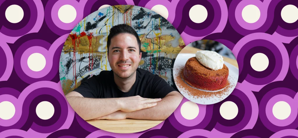 A round, red velvet lava cake, with a dollop of cream on top and a dusting of dark chocolate cocoa powder on the right; Nicolas Norena on the left.